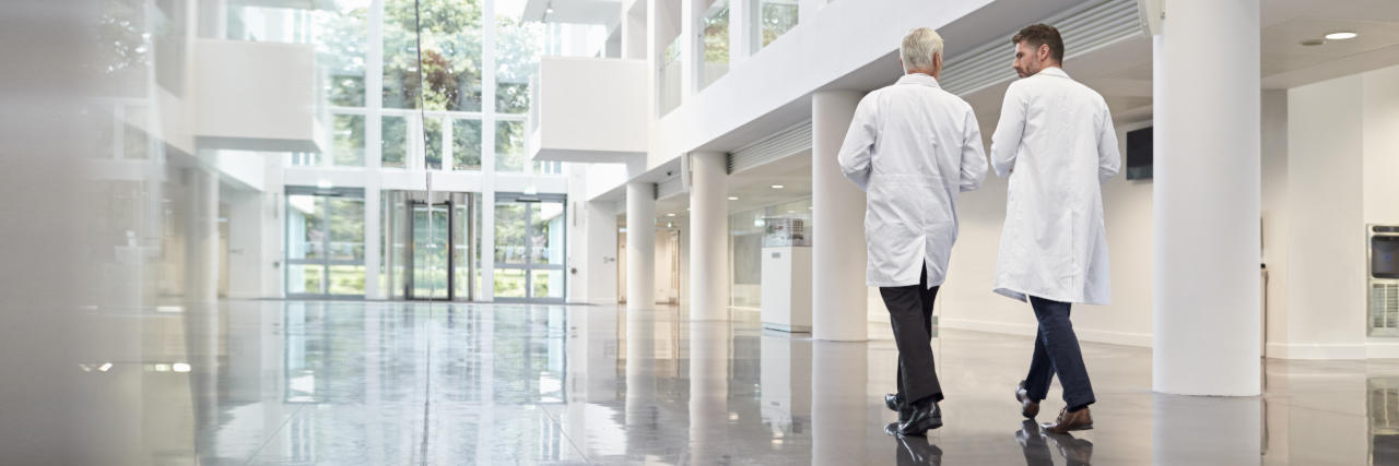 Doctors walking in lobby.