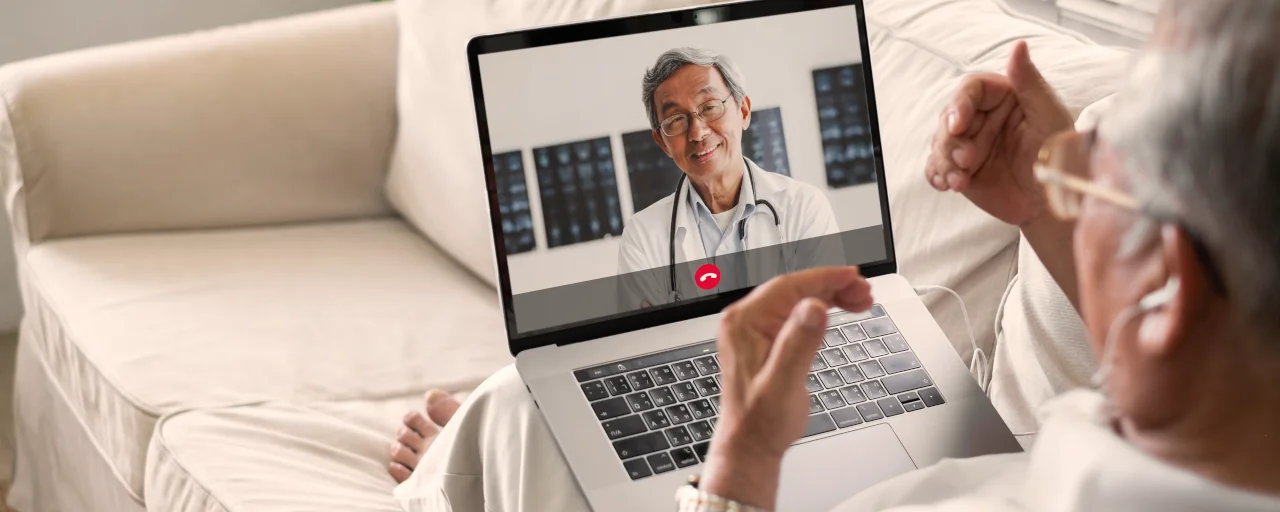 Telemedicine doctor with patient
