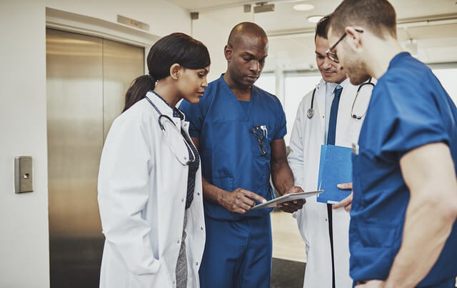 Group of Doctors and Nurses meeting