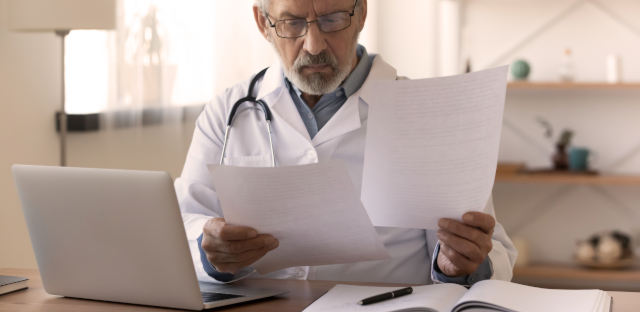 Businessman reviewing an insurance document