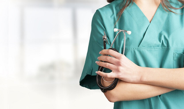 Medical Nurse in green scrubs